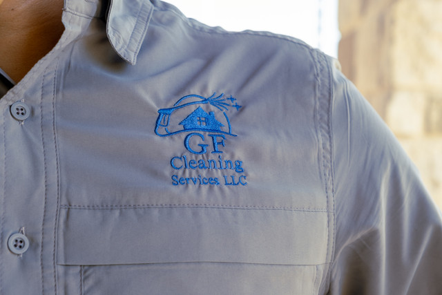 GF Cleaning Services professional team members with cleaning equipment
