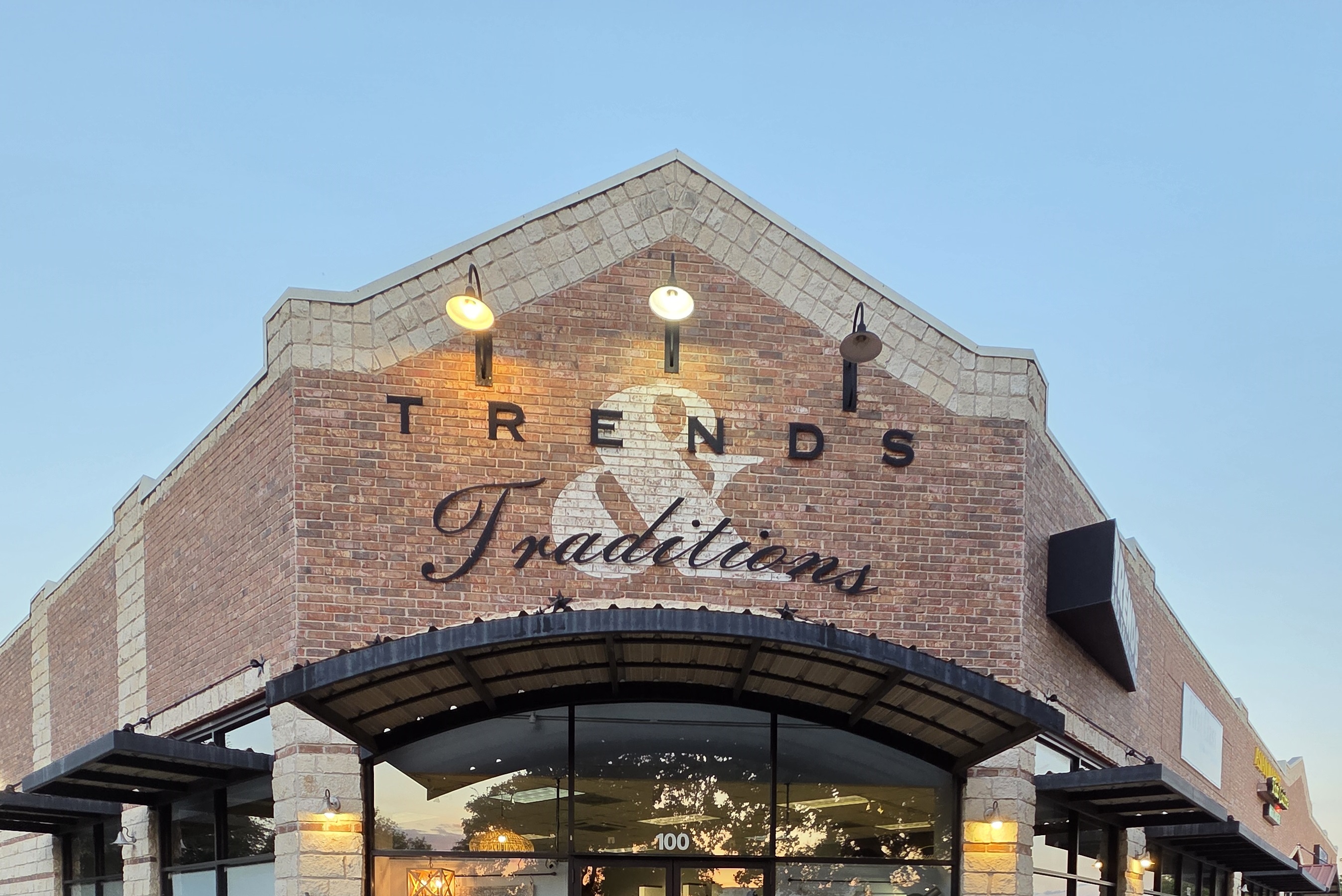 Commercial building exterior being professionally cleaned with power washing equipment